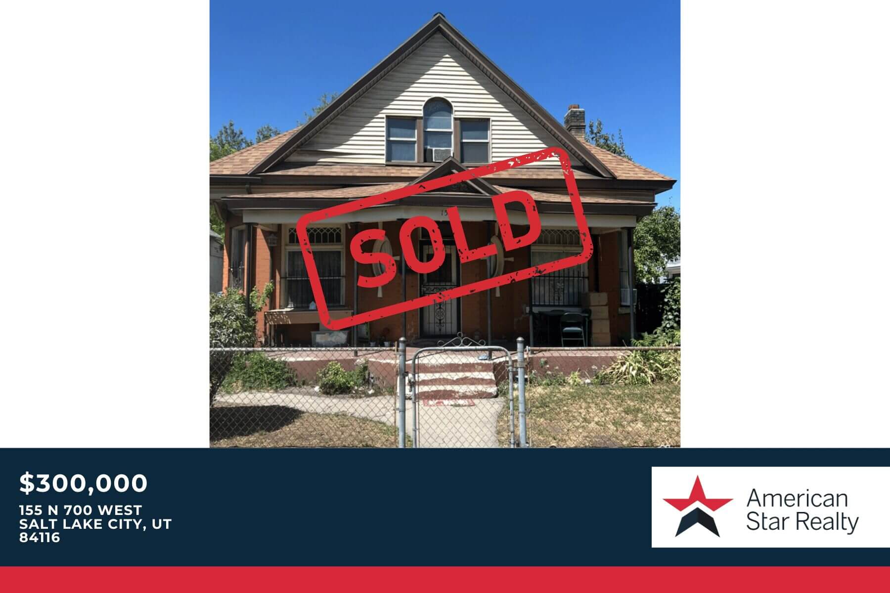 House with "Sold" sign, Salt Lake City.
