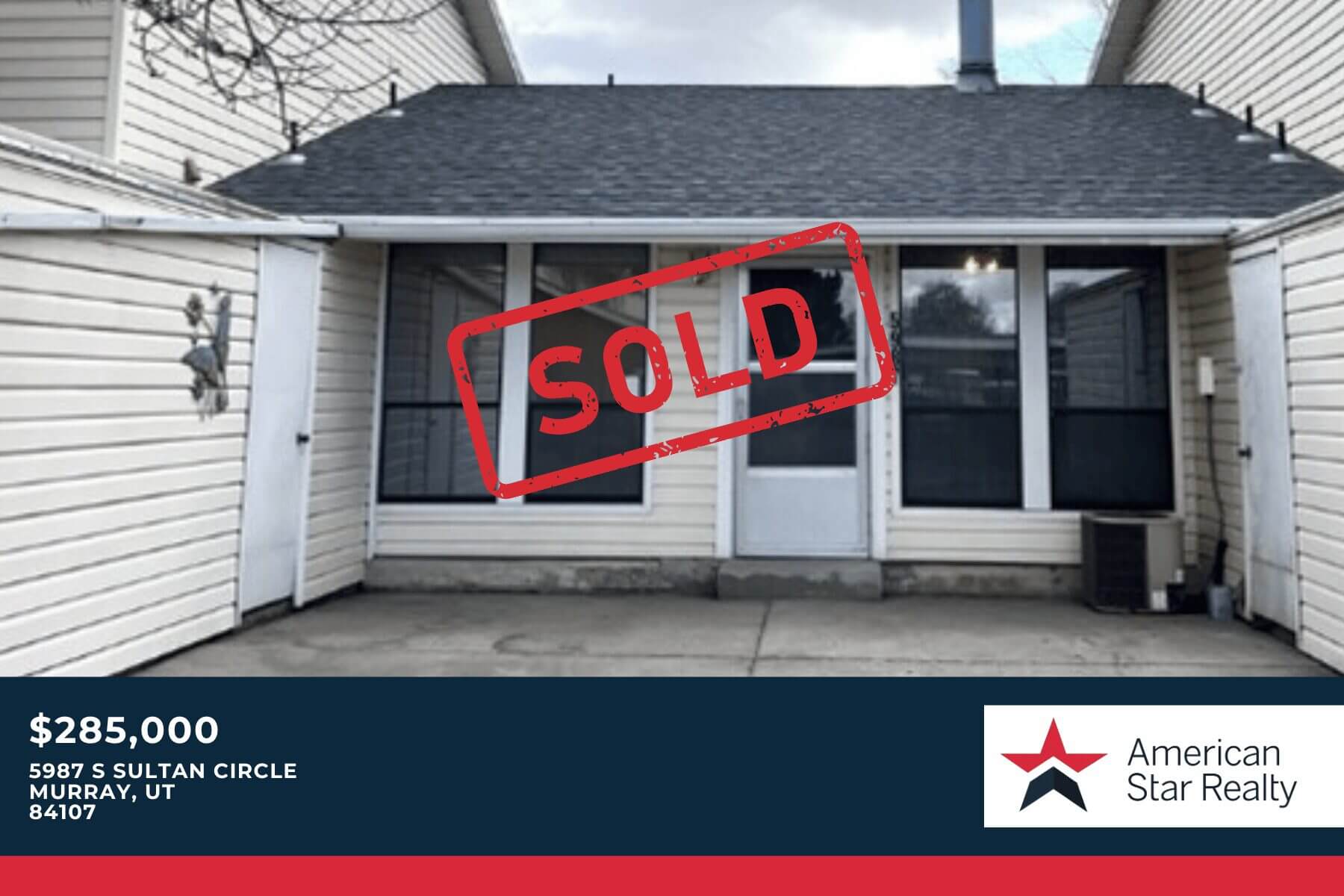 House with "Sold" sign, realty company logo.