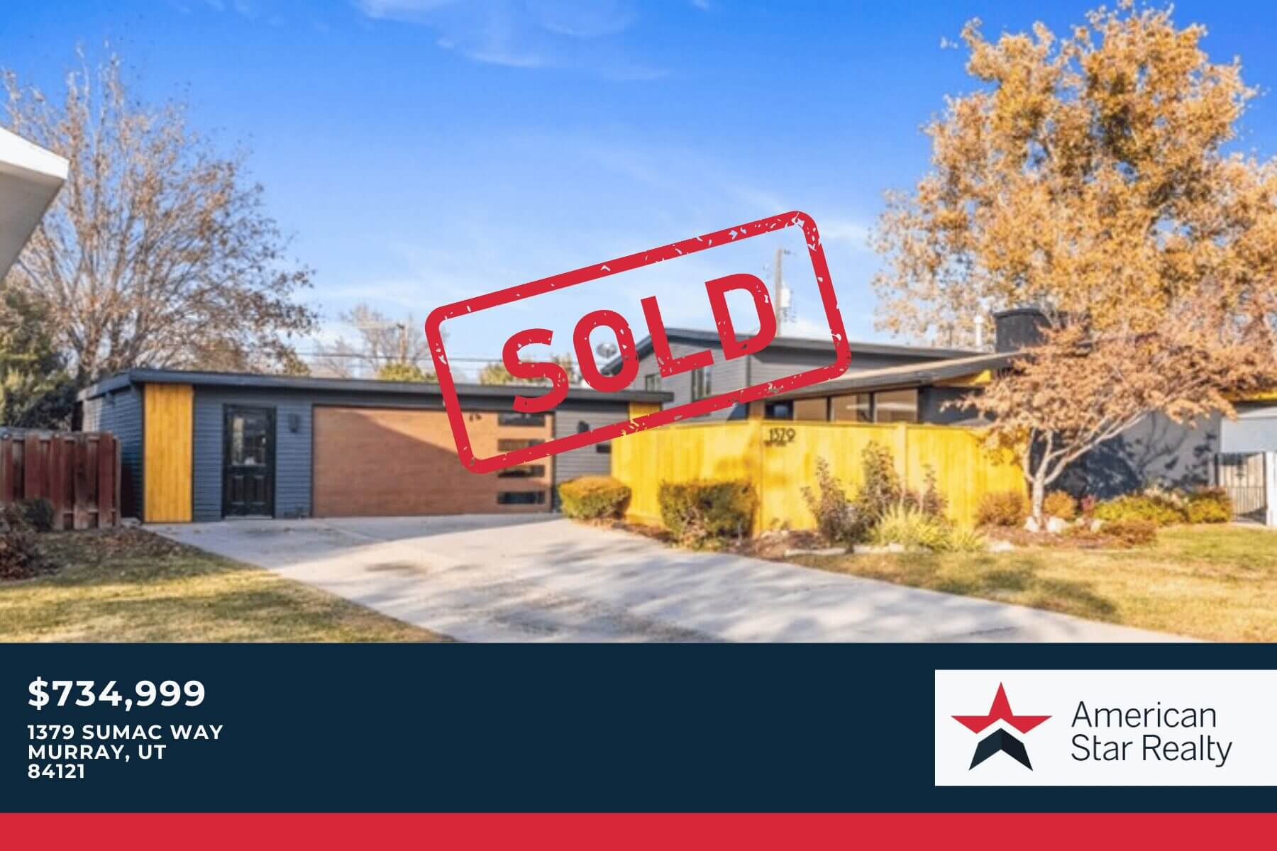 House with "Sold" sign in front yard.